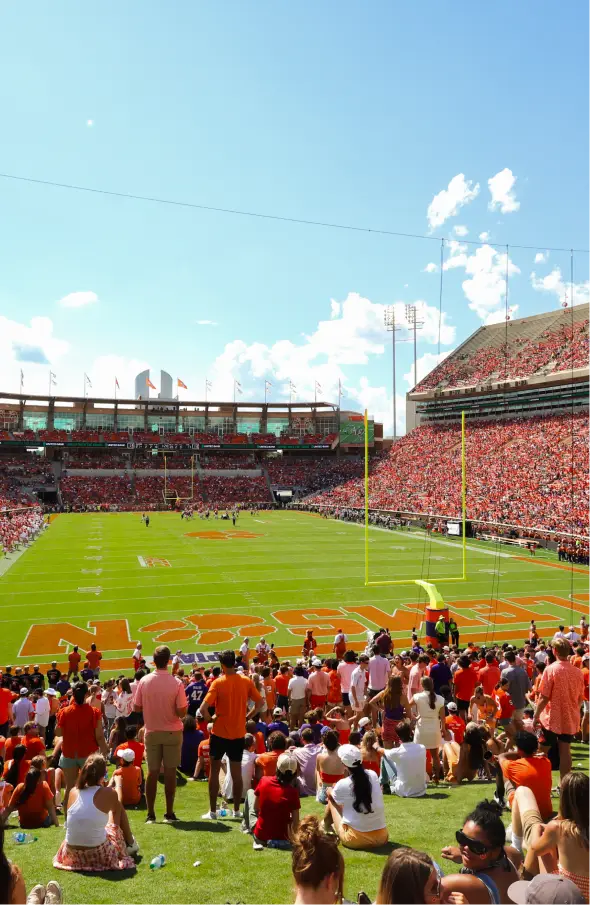 Memorial Stadium is filled with orange-clad fans on a sunny football Saturday.