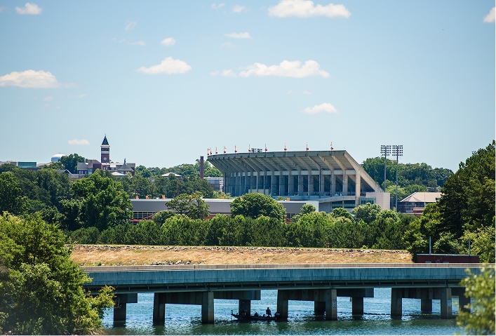 Lake Hartwell in the foreground and Memorial Stadium and Tillman Hall clock tower in the background.