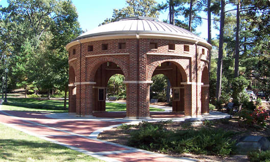 A brick rotunda and brick sidewalks.